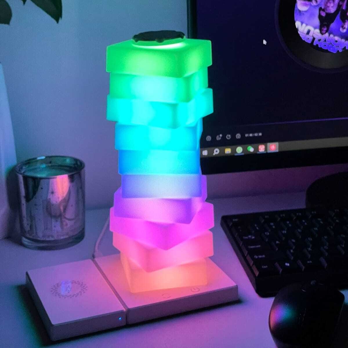 Coluna de iluminação articulável